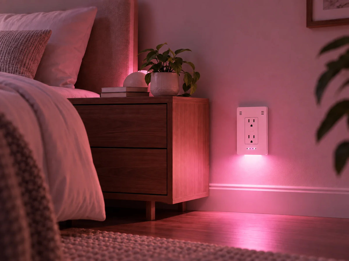 InvisOutlet Aura lighting the same bedroom in rose