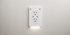 InvisOutlet C Pro installed on a clean white wall