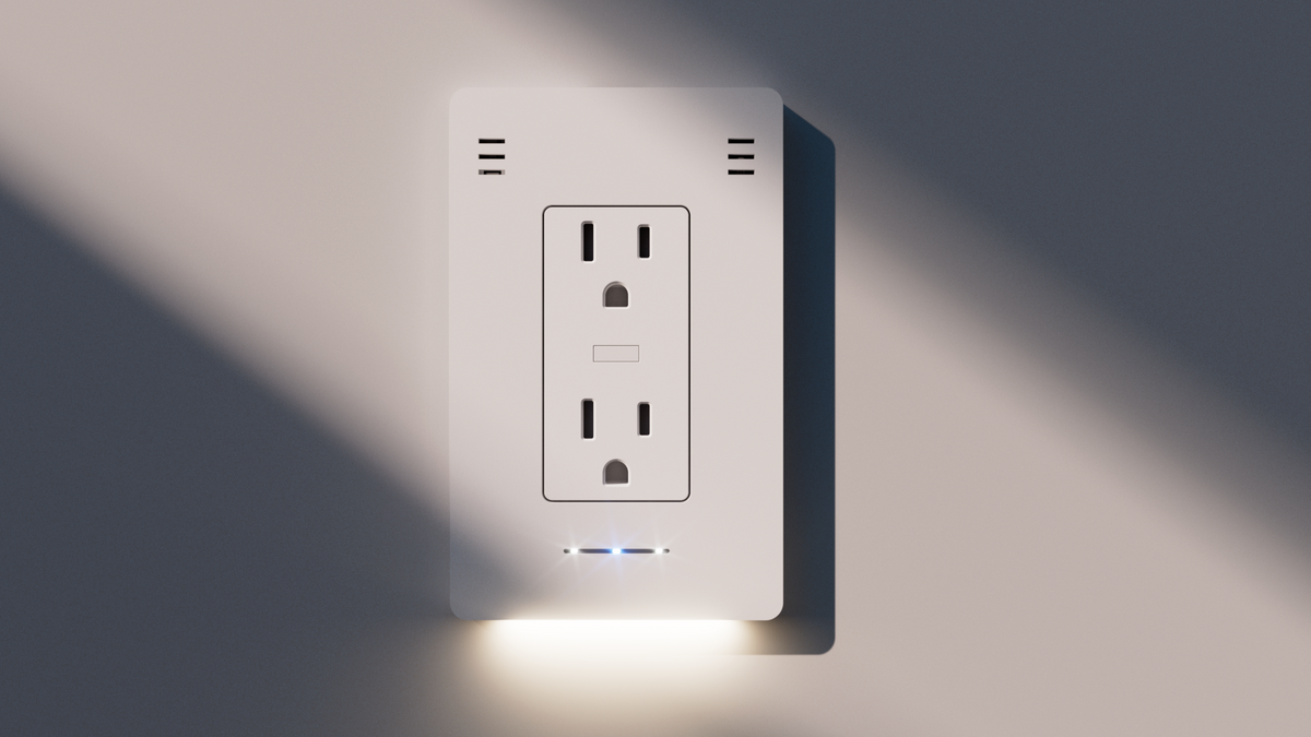 InvisOutlet Pro installed on a softly lit wall.